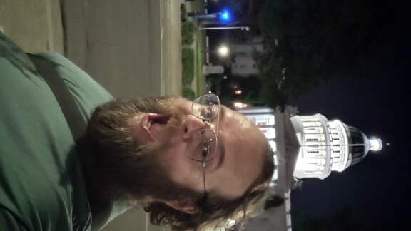 Me at the Capitol Building in Sacramento, CA at night.